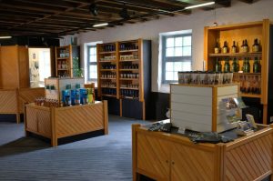 Inside a shop with alcohol and other products